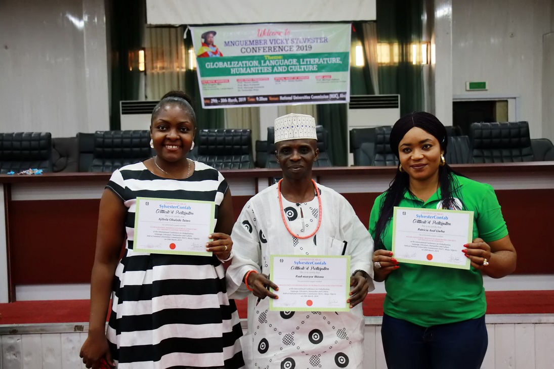 Mr. Paul-Maeyor Ihionu (middle) in a  group photograph with other paper presenters at the SylvesterConfab 2019 held in NUC, Abuja