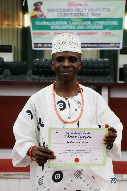 Mr. Paul-Maeyor Ihionu displaying his Certificate of Paper Presentation at the SylvesterConfab 2019