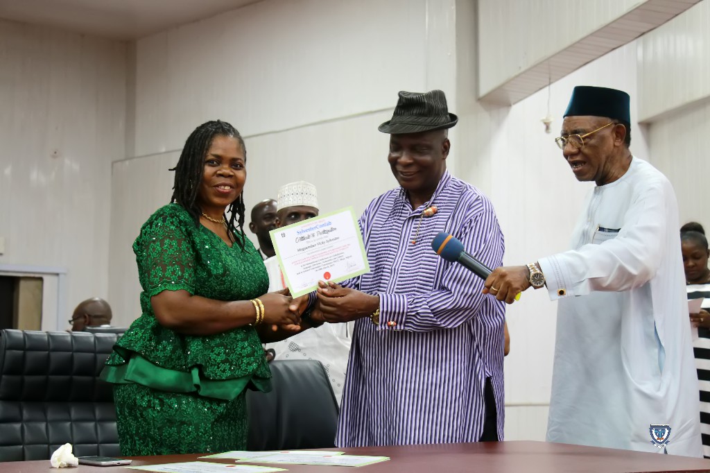 Professor Mnguember Vicky Sylvester (host) receiving a Certificate at the International Conference (SylvesterConfab 2019) held in her honour